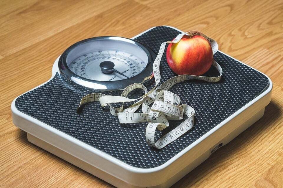 Folk and Knife Placed on Weigh Scale - High Quality Free Stock Images Folk and Knife Placed on Weigh Scale - High Quality Free Stock Images